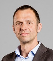 Jens Holm (V), ordförande trafikutskottet.